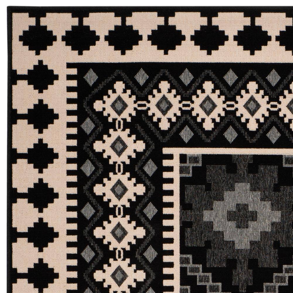 Veranda Black and Cream Synthetic 9' x 12' Easy-Care Outdoor Rug