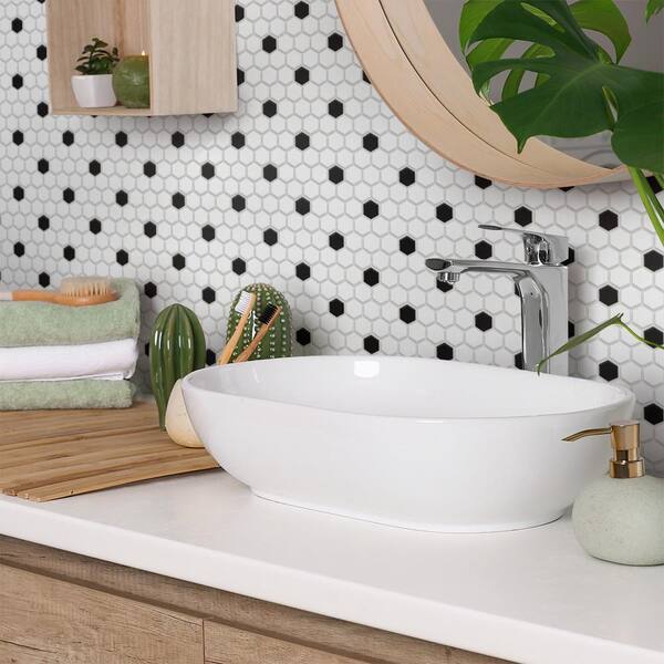 https://images.thdstatic.com/productImages/7e1e4089-32a2-4bd6-ba0d-993b384f5ba0/svn/cool-white-with-black-dot-merola-tile-mosaic-tile-ftc1mmcwd-40_600.jpg