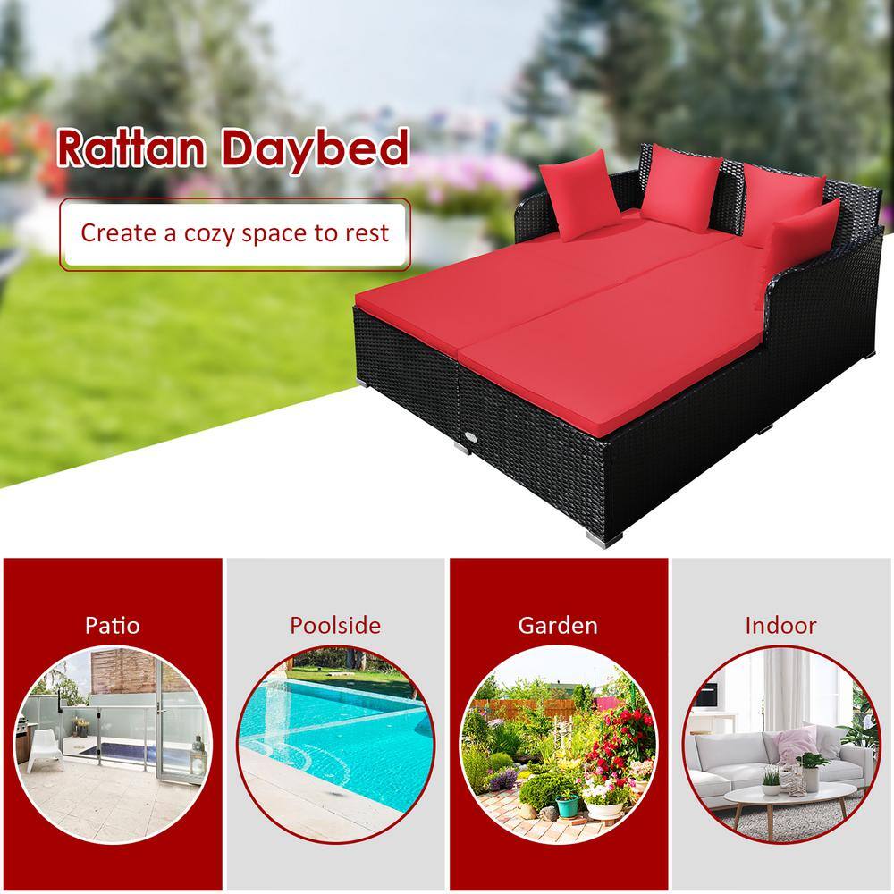 Outdoor Black Rattan Daybed with Red Cushions and Pillows