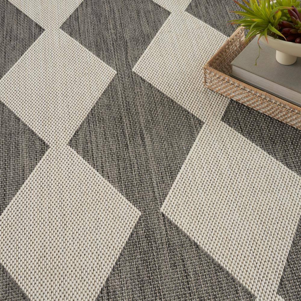 Charcoal and Off-White Diamond Pattern Synthetic 5' x 7' Rug