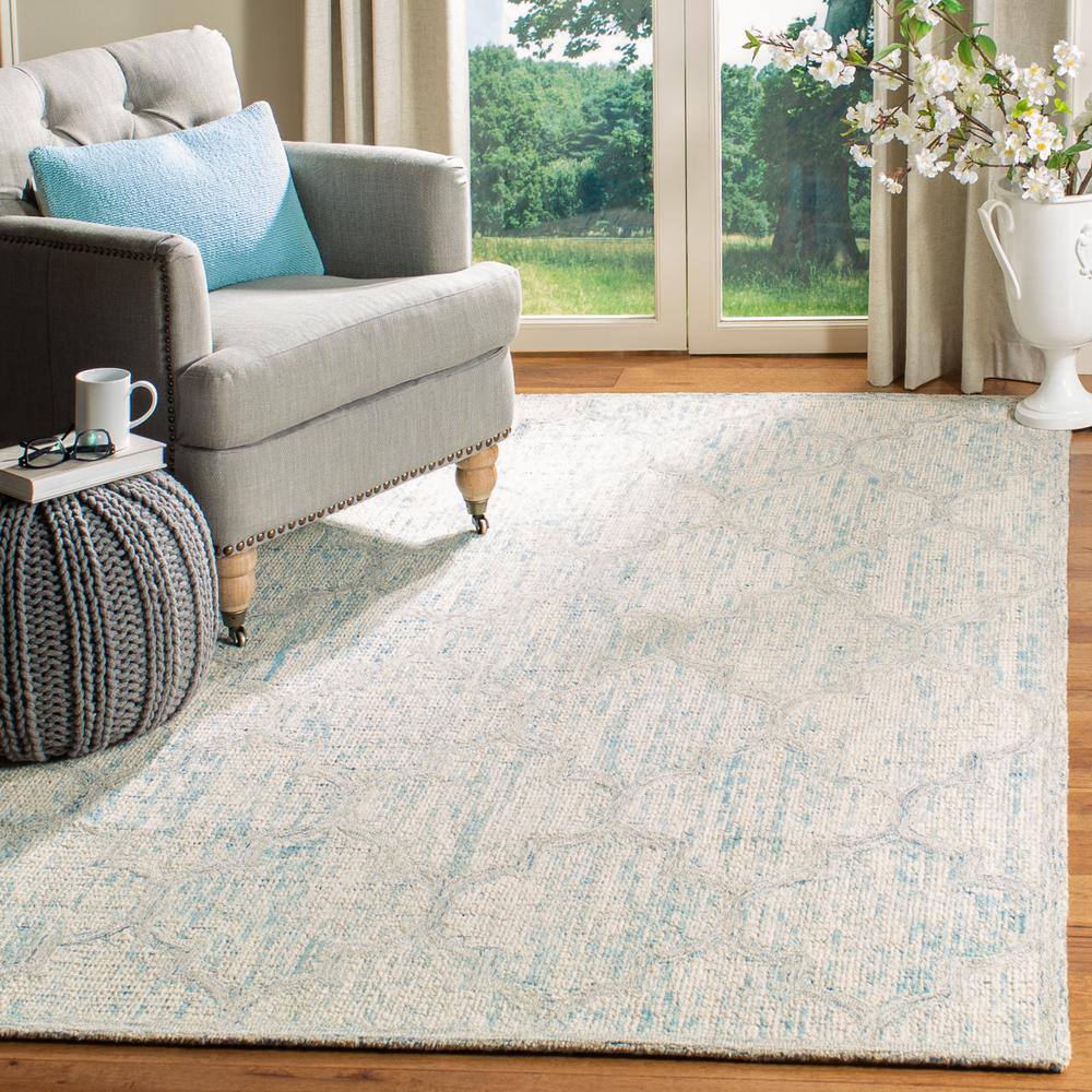 Ivory and Light Blue Handmade Wool Abstract Area Rug