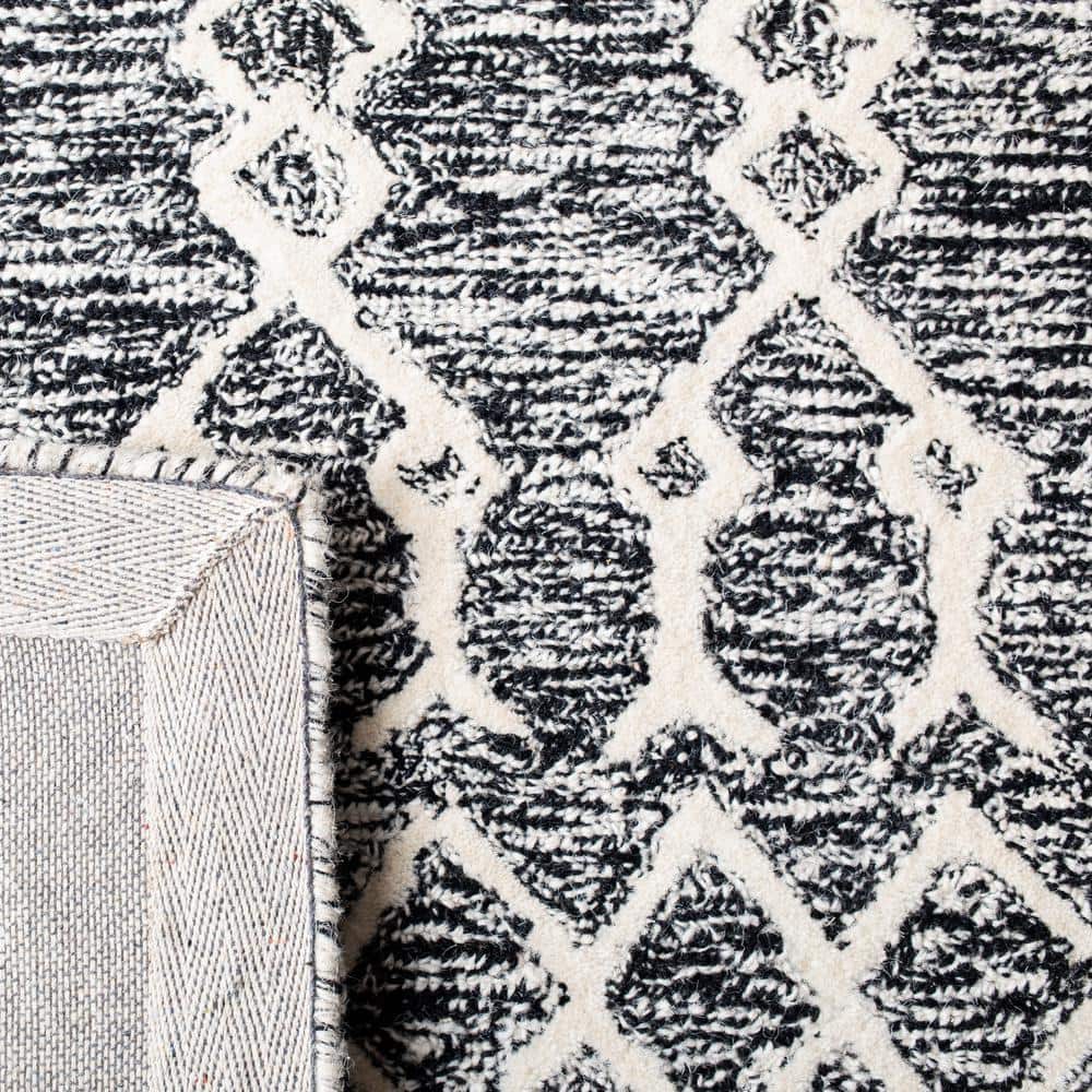 Handmade Black and Ivory Wool Abstract 9' x 12' Area Rug