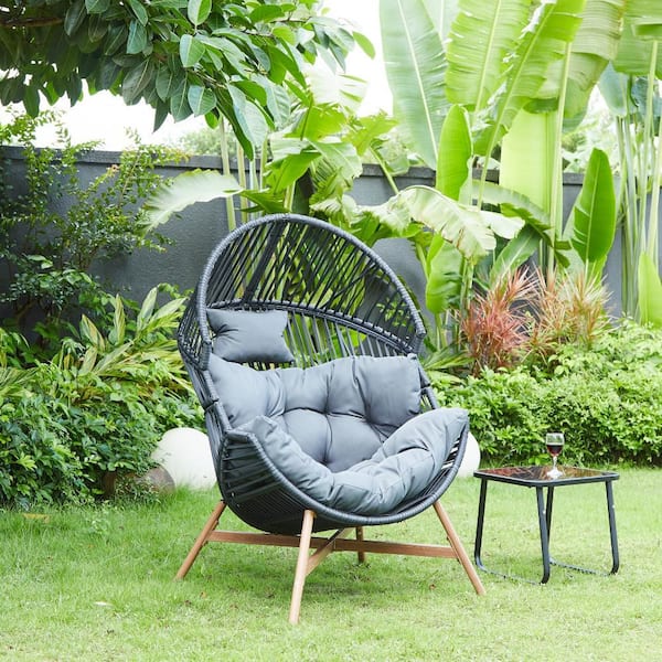 1-Person Black Metal Outdoor Patio Swing Egg Chair Natural Color Wicker with Beige Cushion