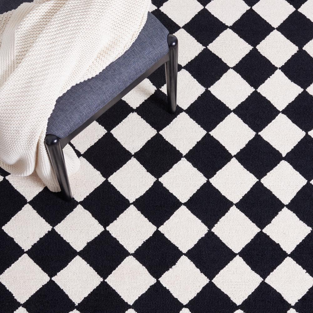 Handmade Black and Ivory Wool Floral Small Rug