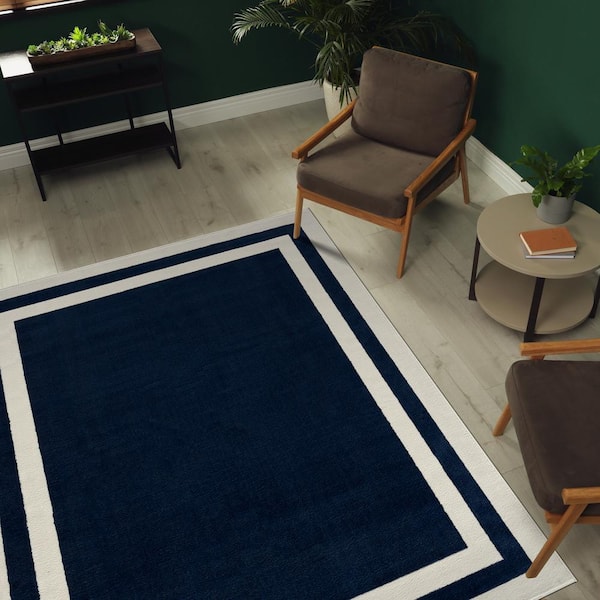 https://images.thdstatic.com/productImages/7ebe0df2-0419-4fde-a258-3524f6e87227/svn/navy-blue-cream-camilson-area-rugs-cry1003-nvy-8x10-hd-4f_600.jpg