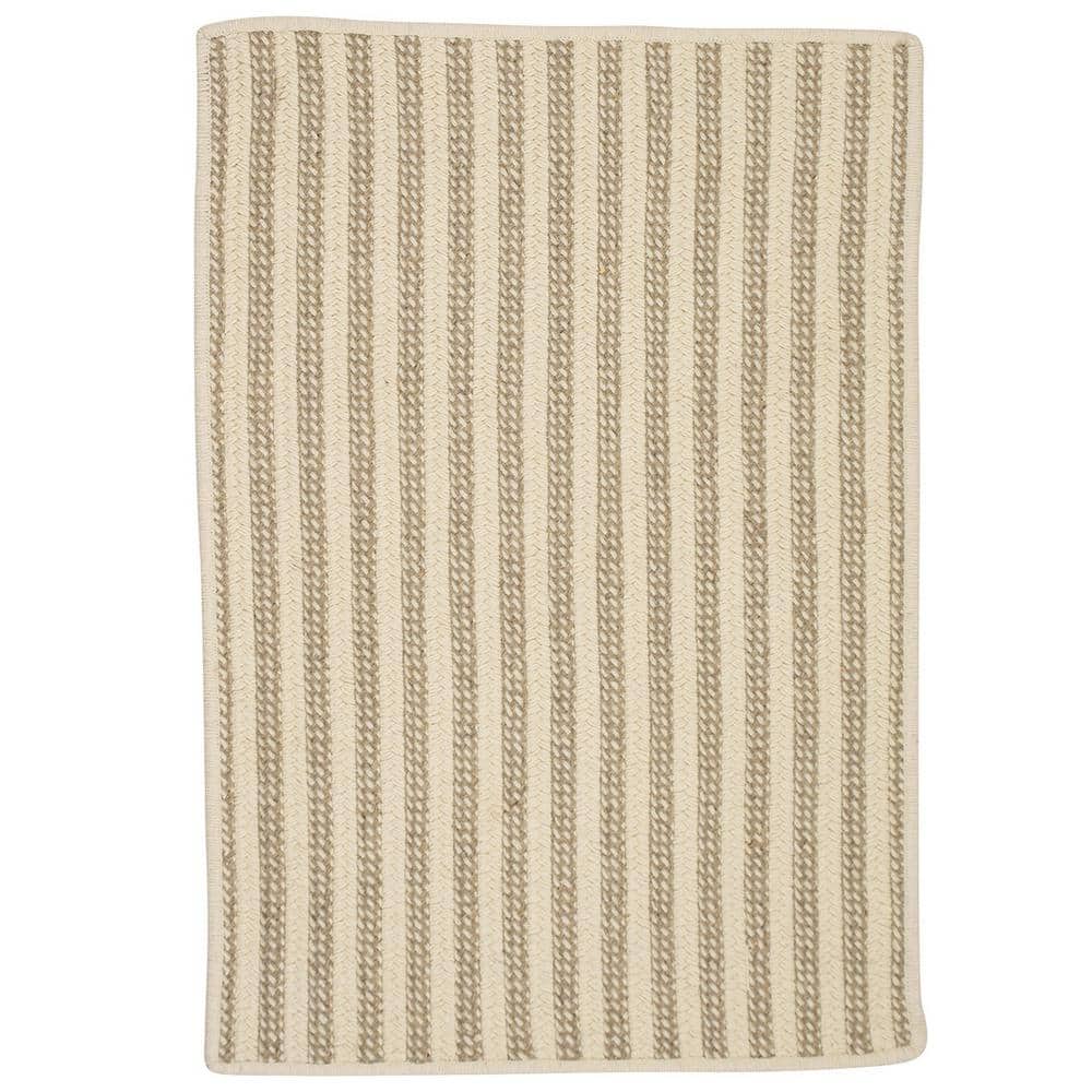 Home Decorators Collection Virginia Natural 3 ft. x 5 ft. Rectangle Braided Area Rug, Beige For underfoot comfort and added style, choose the Home Decorators Collection 3 ft. x 5 ft. Area Rug. This braided rug has a modern style, so you can spice up any room in your office with a fresh, contemporary piece. Designed with elements of beige, it will tone down your decor. It has a 100% wool design, offering extra comfort and thickness. Featuring materials known to have low VOC emissions, it is a safe option for your living area. Embellished with striped detailing, this braided rug creates an illusion of added space in your home. It has a braided weave type and the same pattern on both sides.