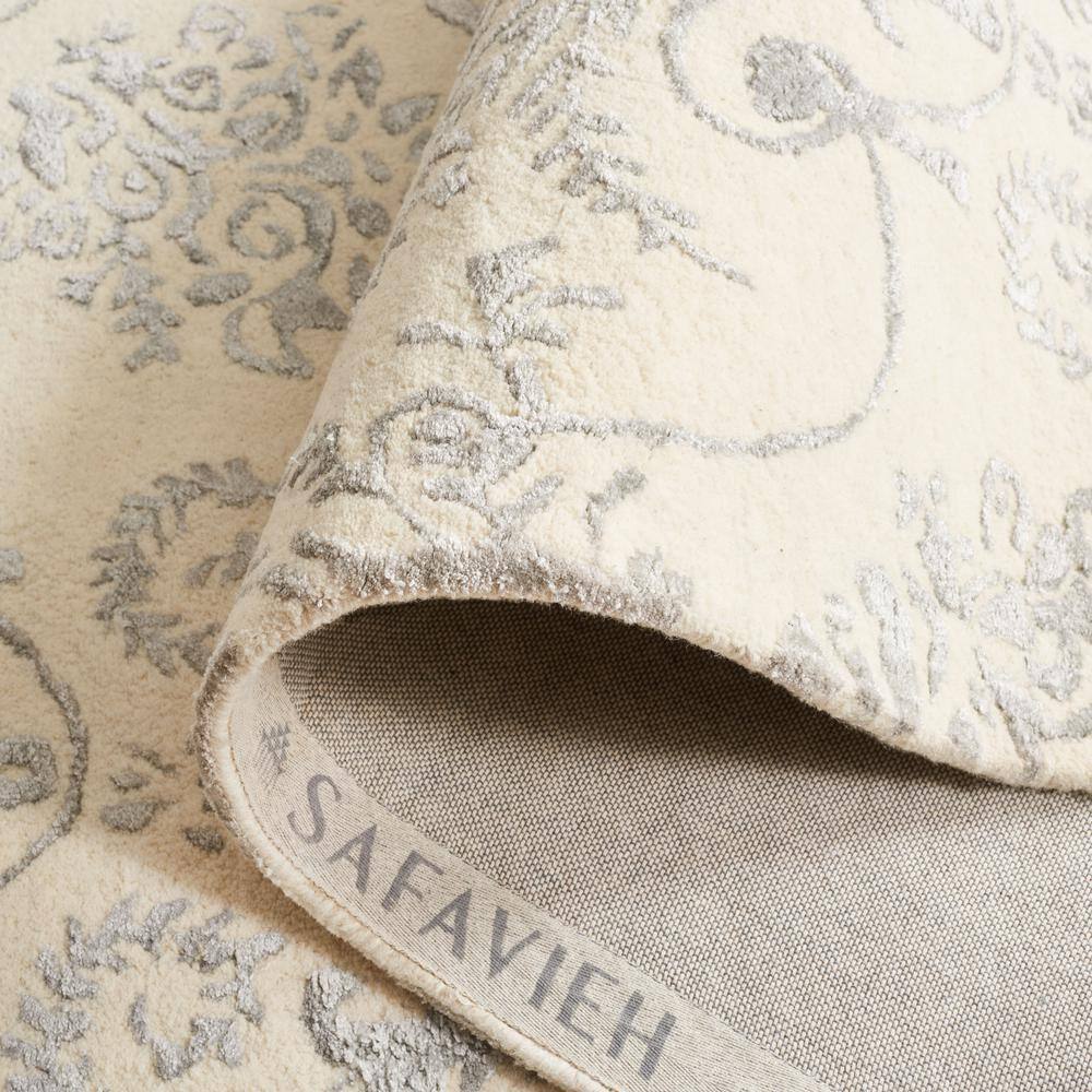 Gray and Ivory Hand-Tufted Wool and Viscose 4' x 6' Area Rug