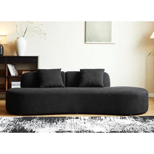 Black velvet curved sofa hotsell