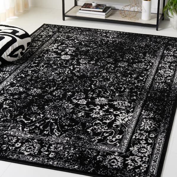 Adirondack Black/Ivory 6 ft. x 9 ft. Border Distressed Area Rug