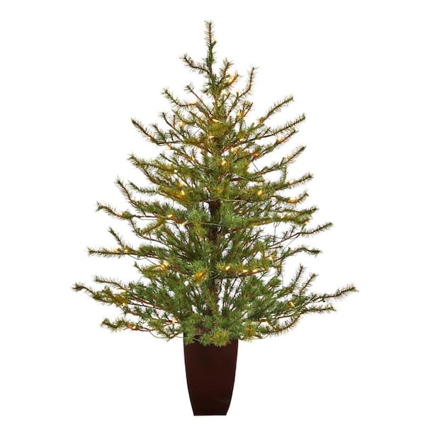 Christmas background of natural and artificial pine branches with