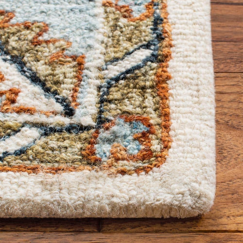 Ivory and Rust Medallion Wool 8' x 10' Handmade Tufted Rug
