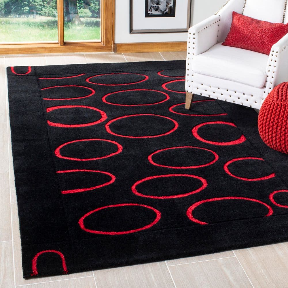 Soho 5 ft. x 8 ft. Black/Red Abstract Rings Area Rug price history on PriceWatchPro