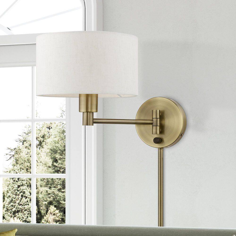 Antique Brass Swing Arm Wall Lamp with Oatmeal Fabric Shade