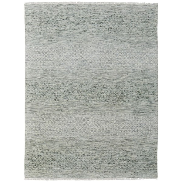 6 ft. x 9 ft. Ivory and Green Wool Hand Knotted Area Rug With Fringe