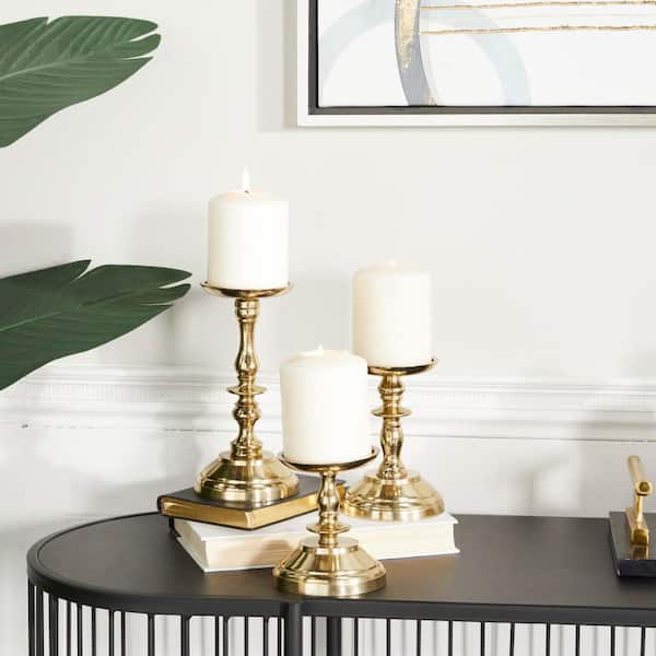 Litton Lane Gold Aluminum Pillar Candle Holder (Set of 3)