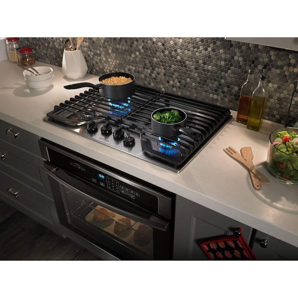 https://images.thdstatic.com/productImages/7f509def-ba70-4862-b8fe-3bb9f45f7214/svn/stainless-steel-amana-gas-cooktops-agc6540kfs-4f_600.jpg