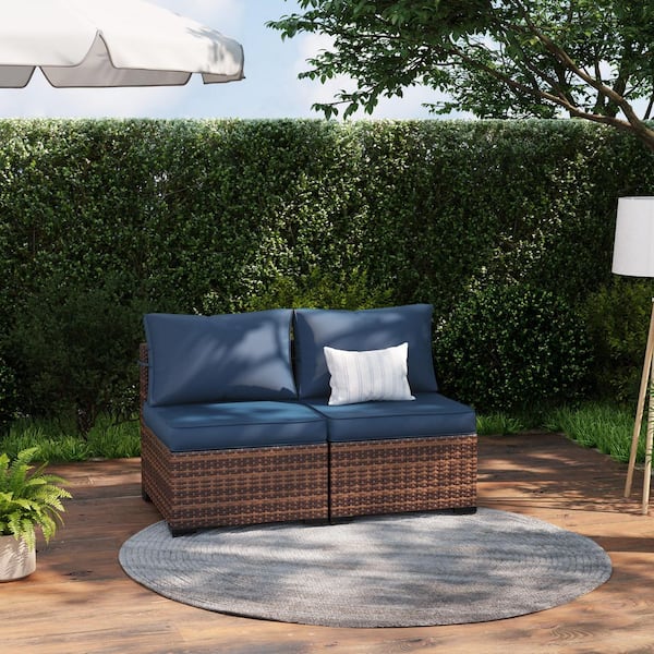 Brown Wicker Outdoor Loveseat with Navy Cushions