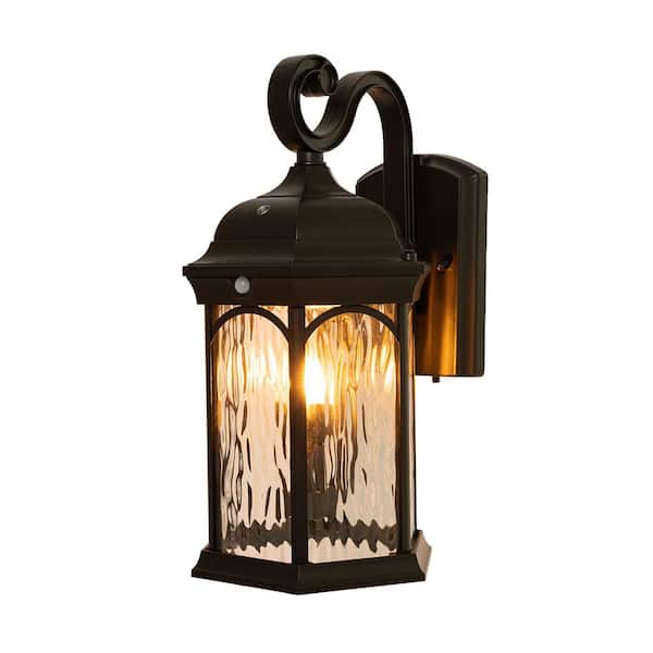 Home Decorators Collection 16.1 in. Bronze Integrated LED Motion Sensing Dusk to Dawn Outdoor Wall Light Lantern Sconce with Flickering Bulb
