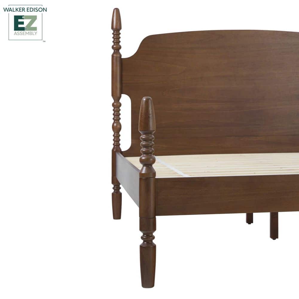 Side angle view of the brown solid wood queen platform bed.