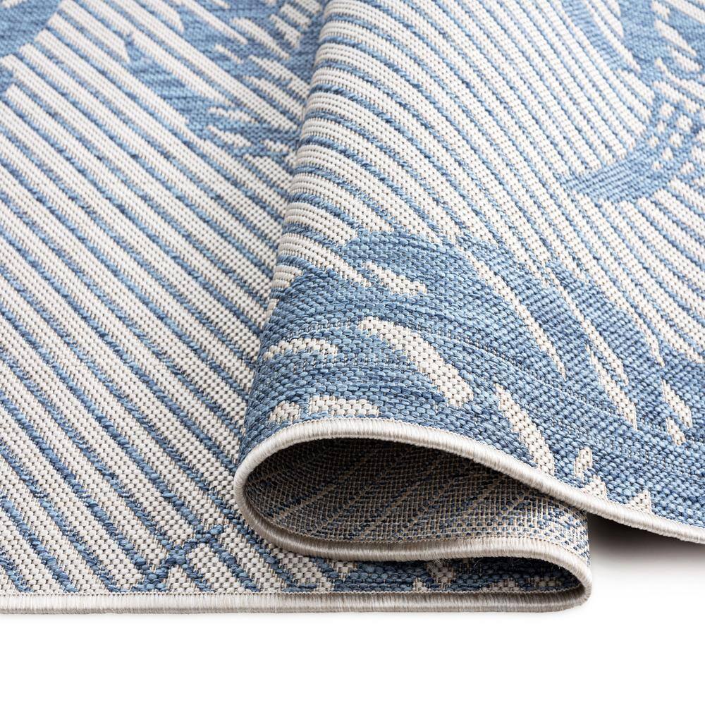 Palm Leaf Blue and Silver Synthetic Indoor/Outdoor Area Rug
