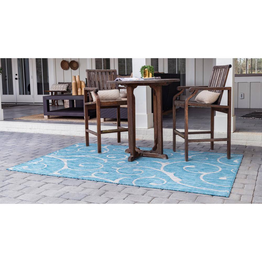 Aqua Blue 9' x 12' Abstract Synthetic Outdoor Rug