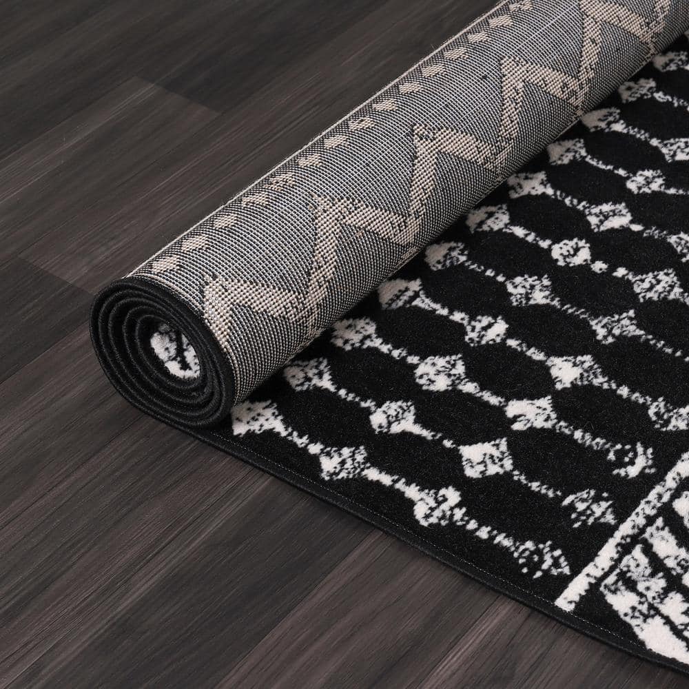 Camilson Black and White Geometric 8' x 10' Synthetic Area Rug