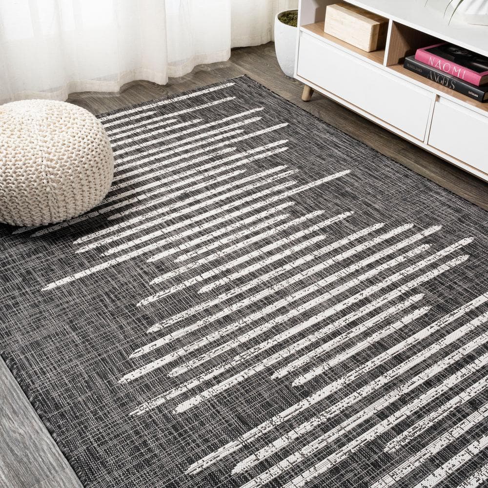 Zolak 4' x 6' Black and Ivory Synthetic Stripe Rug