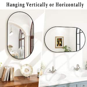20 in. W x 36 in. H Oval Metal Framed Wall Bathroom Vanity Mirror Black