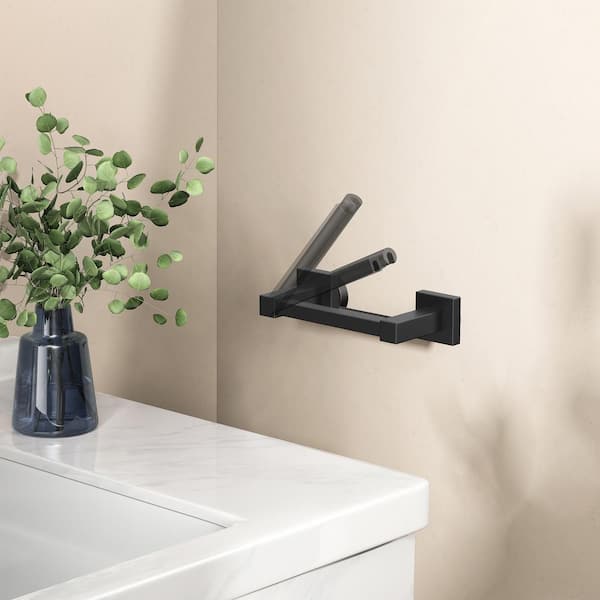 Wall-Mount Pivoting Double Post Toilet Paper Holder in Matte Black