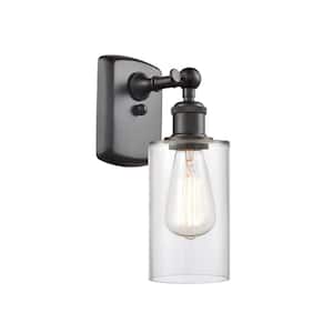 Clymer 1-Light Oil Rubbed Bronze Clear Wall Sconce with Clear Glass Shade