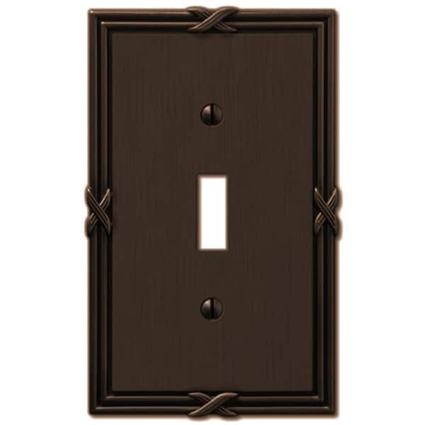 AMERELLE Ribbon and Reed 1 Gang Toggle Metal Wall Plate - Aged Bronze