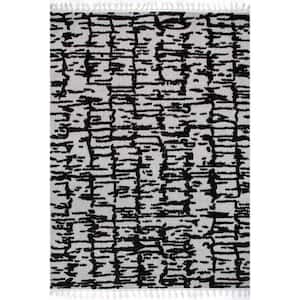 Cosette Abstract High Low Textured Tassel Black 6 ft. 7 in. x 9 ft. Area Rug