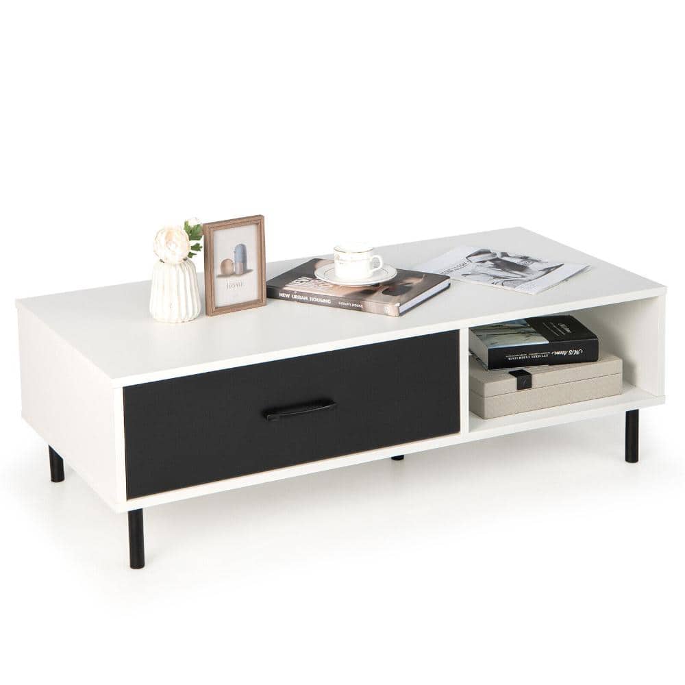 White and black modern 2-tier coffee table with one drawer and an open shelf.