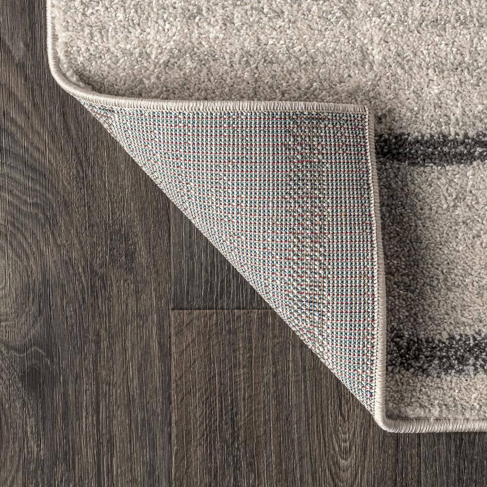 Cream and Gray Striped Synthetic 4' x 6' Area Rug