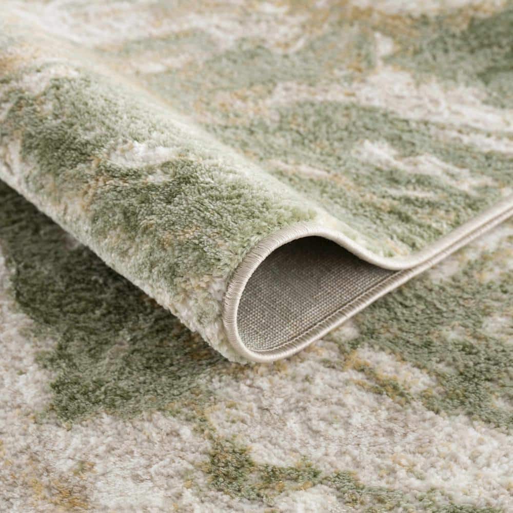 Green and Cream Abstract Polypropylene Area Rug 6'7" x 9'