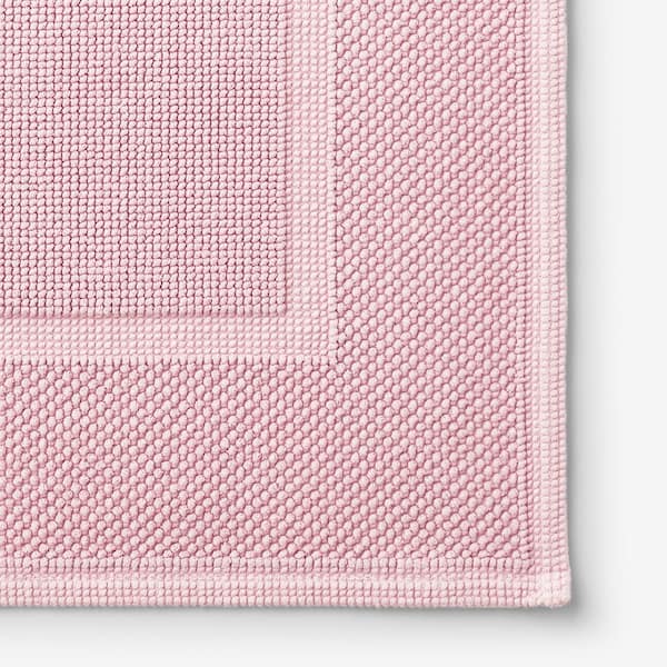 https://images.thdstatic.com/productImages/7fe1ed79-4bc2-4ccd-9605-e0c76222336f/svn/soft-pink-the-company-store-bathroom-rugs-bath-mats-59071-21x34-sft-pink-e1_600.jpg