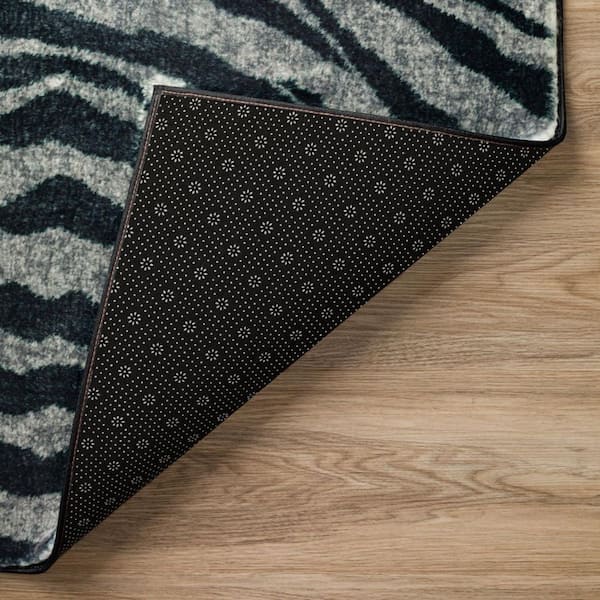 8' Round Black Animal Print Runner Rug