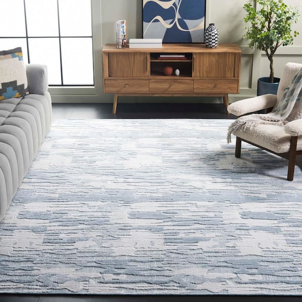 Mirage 9 ft. x 12 ft. Light Blue/Ivory High-Low Abstract Area Rug