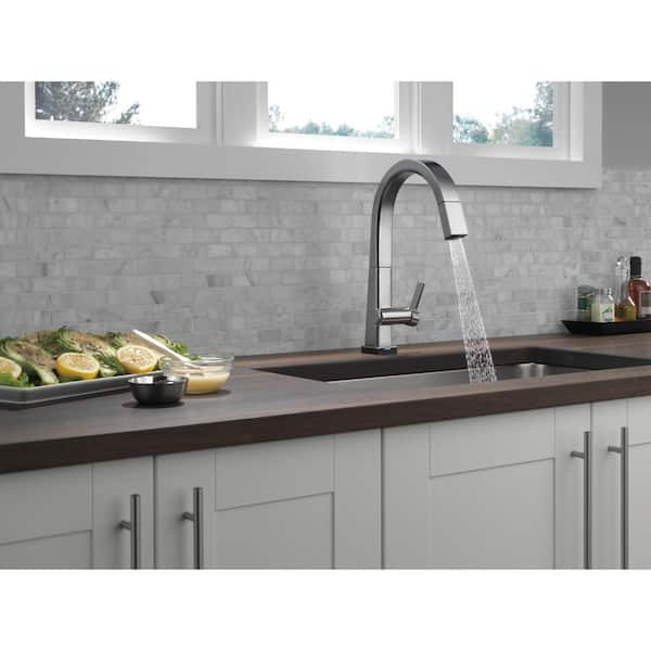 https://images.thdstatic.com/productImages/801cc180-eaa7-411c-b22b-b51575ce9e02/svn/arctic-stainless-delta-pull-down-kitchen-faucets-9193t-ar-dst-e1_600.jpg