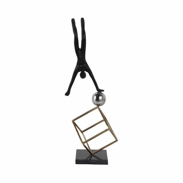 Liv & Skye Black 7 in. x 19 in. Metal Gymnast On Ball and Cube Sculpture