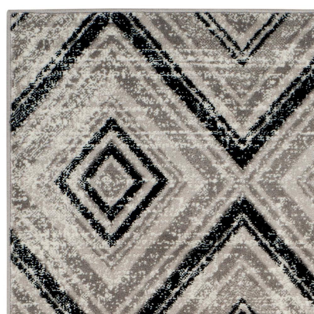 Skyler Silver Geometric Medallion Synthetic Area Rug