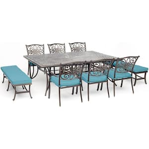 Traditions 9-Piece Aluminum Outdoor Dining Set with Blue Cushions 6-Chairs 2-Benches and Cast-Top Dining Table