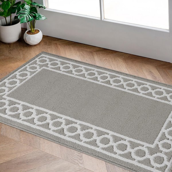 https://images.thdstatic.com/productImages/806160a6-32d9-5d99-850b-e5a87959b076/svn/light-grey-and-white-jean-pierre-area-rugs-yma016648-31_600.jpg