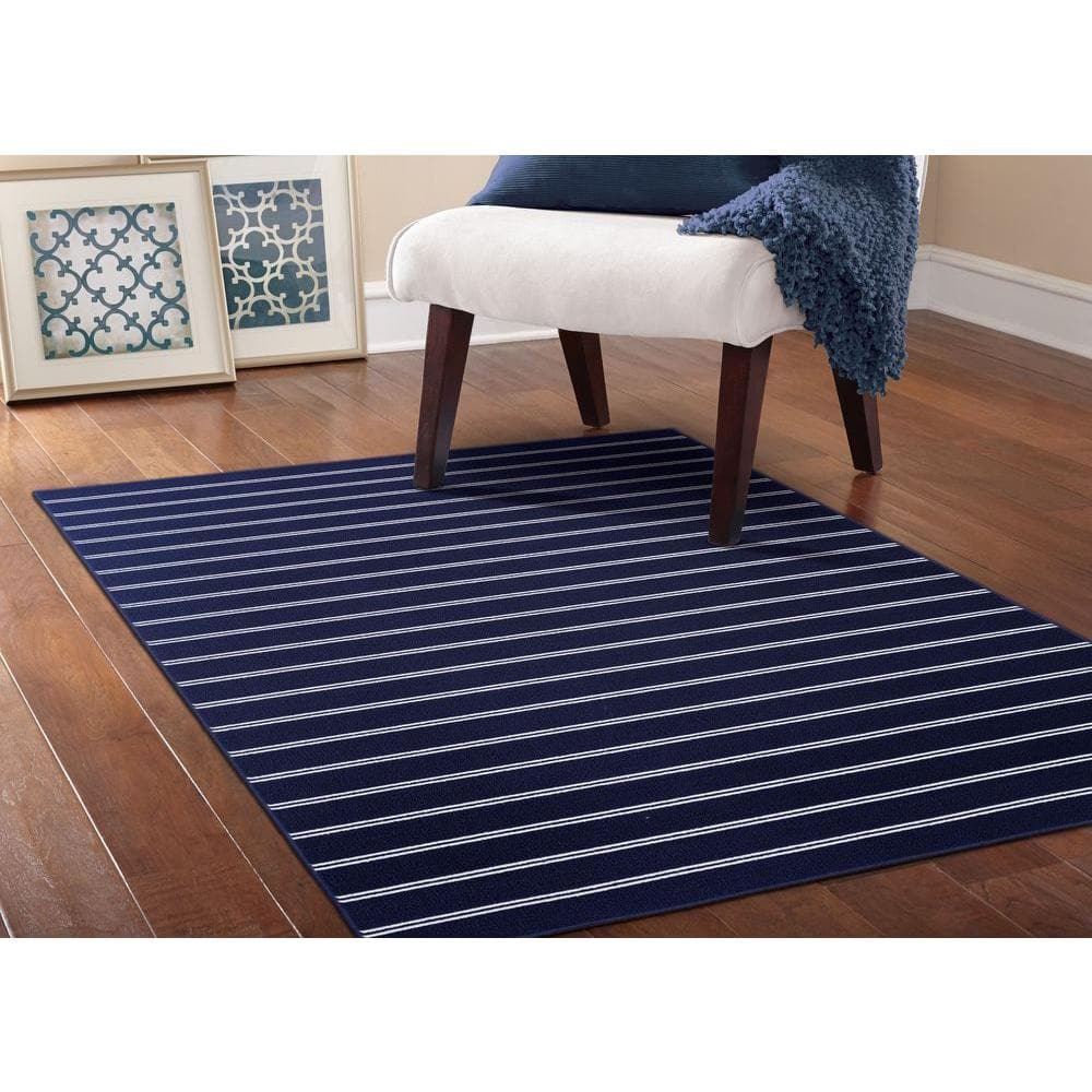 Avery 5' x 7' Blue Tufted Synthetic Stripe Area Rug