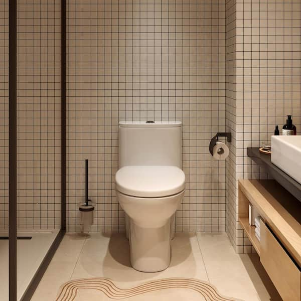 1-Piece 1.1/1.6 GPF Dual Flush Compact Elongated WaterSense Toilet in White Soft Close Seat Included