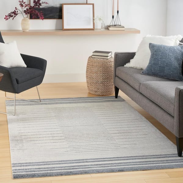 Astra Machine Washable Ivory Blue 5 ft. x 7 ft. Striated Contemporary Area Rug