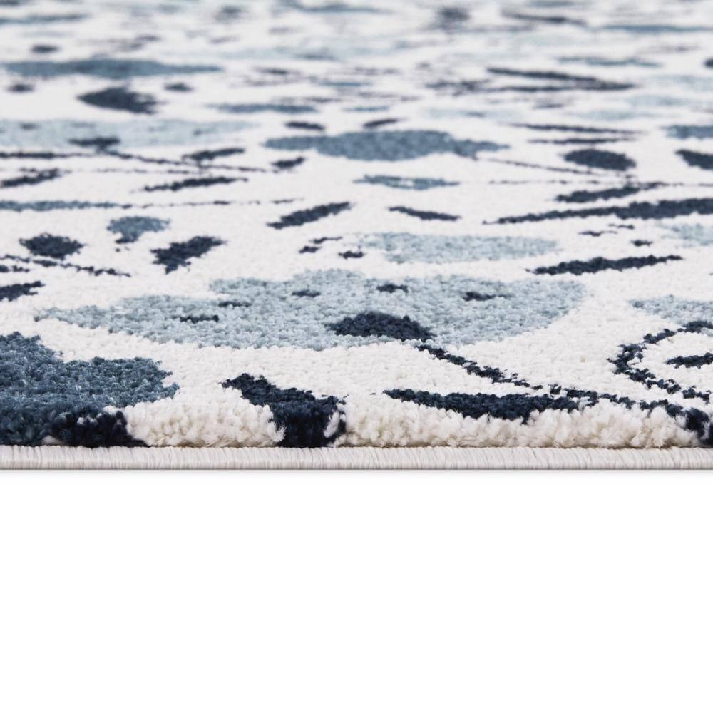 Kelsey Cream and Blue Floral Stain-Resistant Synthetic Area Rug
