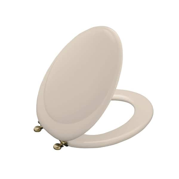 KOHLER Revival Elongated Closed-Front Toilet Seat with Vibrant Brushed Bronze hinges