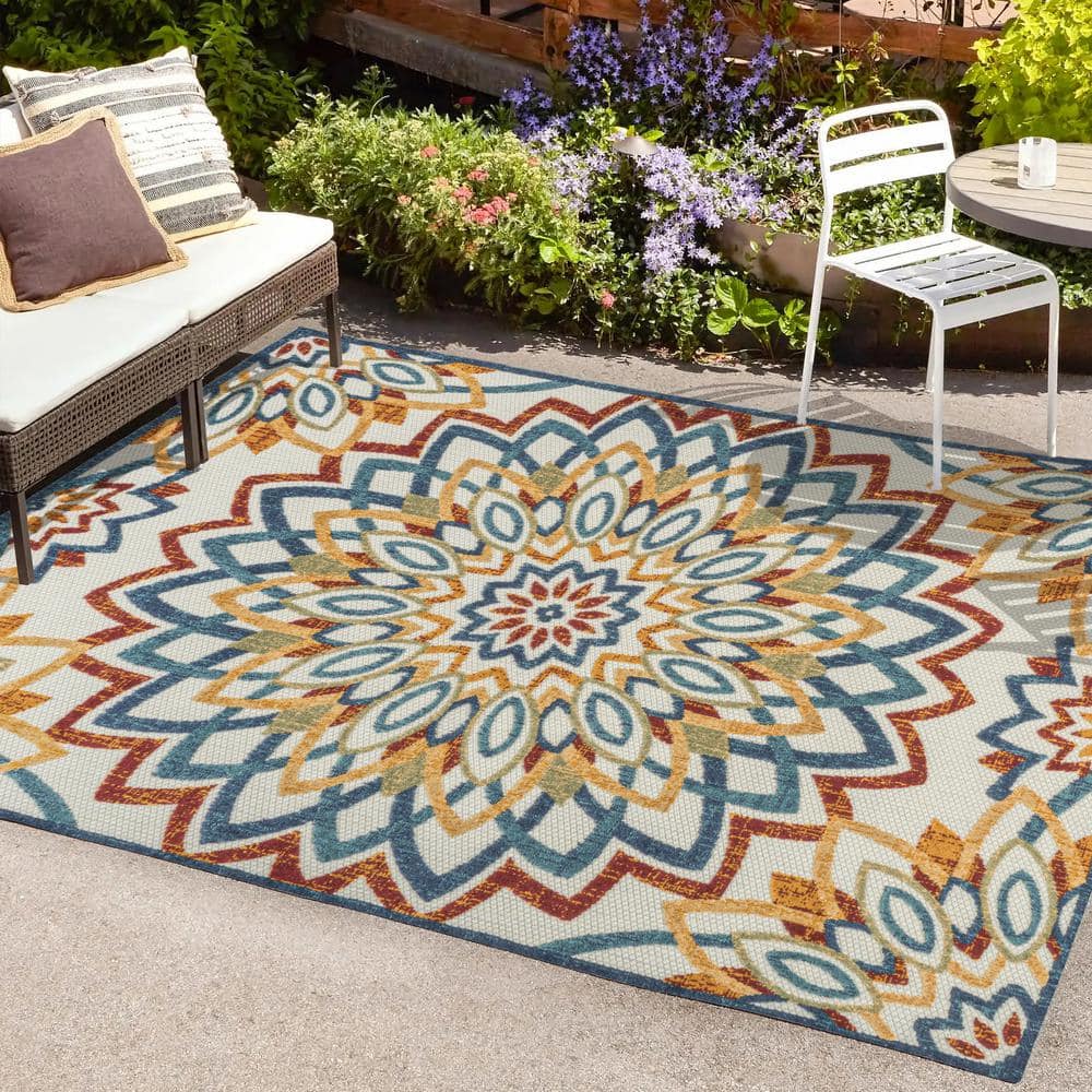 https://images.thdstatic.com/productImages/8098d730-09c1-4487-9c50-189d2da40767/svn/red-blue-yellow-jonathan-y-outdoor-rugs-amc112a-3-64_1000.jpg