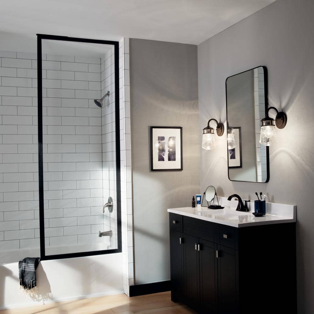 Lyndon 11.25" Bronze and Clear Seeded Glass Wall Sconce